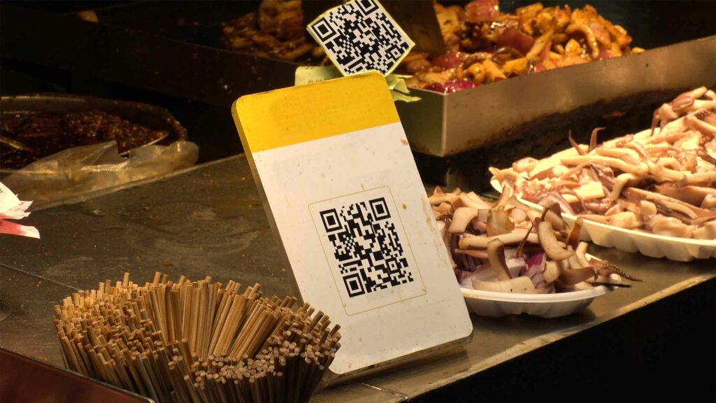 Barcode use case in a food court. QR code next to a product.